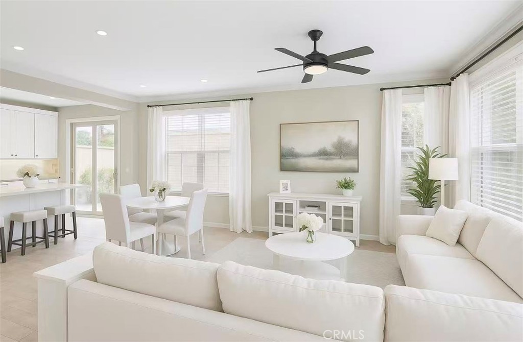 254 Kempton Irvine, CA 92620 - Photo 9 of 18 a living room with furniture and a large window