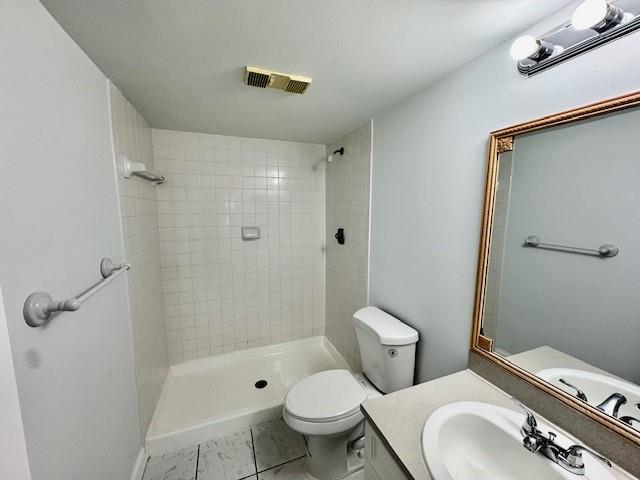 10006 Winding Lake Road, Unit 101 Sunrise, FL 33351 - Photo 13 of 14 a bathroom with a sink toilet and shower