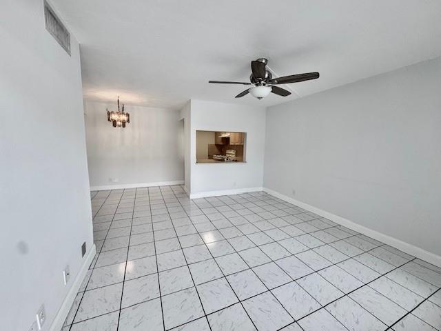 10006 Winding Lake Road, Unit 101 Sunrise, FL 33351 - Photo 7 of 14 a view of an empty room and window