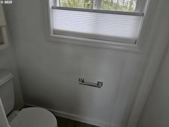 a bathroom with a toilet