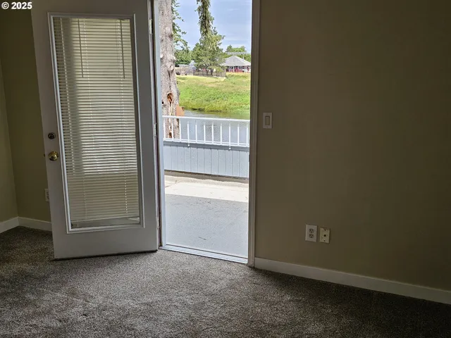 an empty room with sliding door