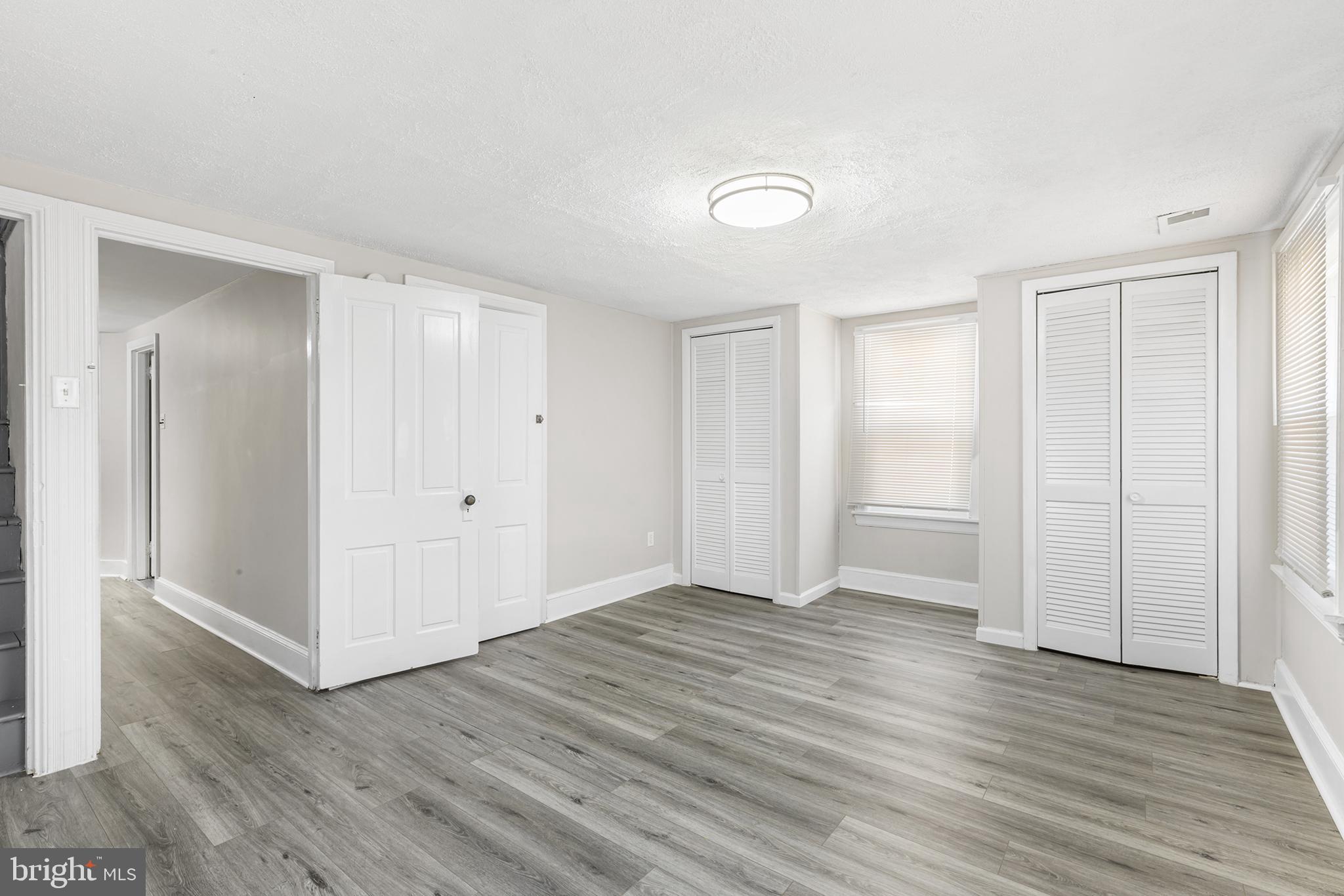 205 Callanan Avenue Bryn Mawr, PA 19010 - Photo 14 of 26 a view of an empty room with wooden floor