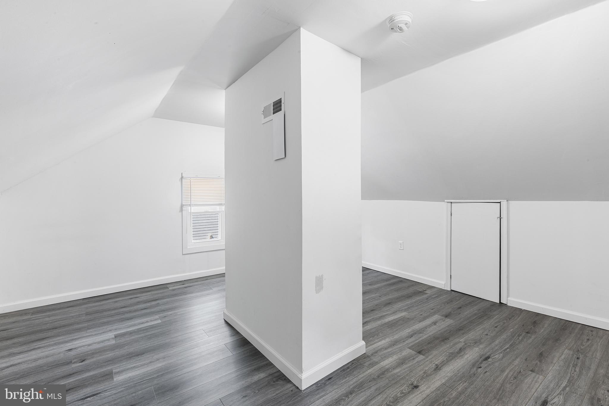 205 Callanan Avenue Bryn Mawr, PA 19010 - Photo 22 of 26 a view of an empty room with wooden floor