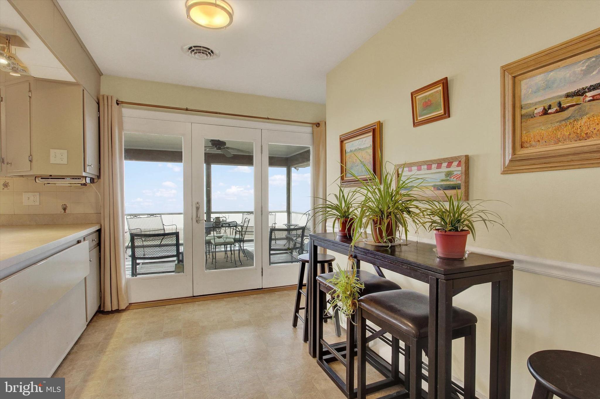 110 Lees Mill Road Hampstead, MD 21074 - Photo 18 of 39 a dining room with furniture and window