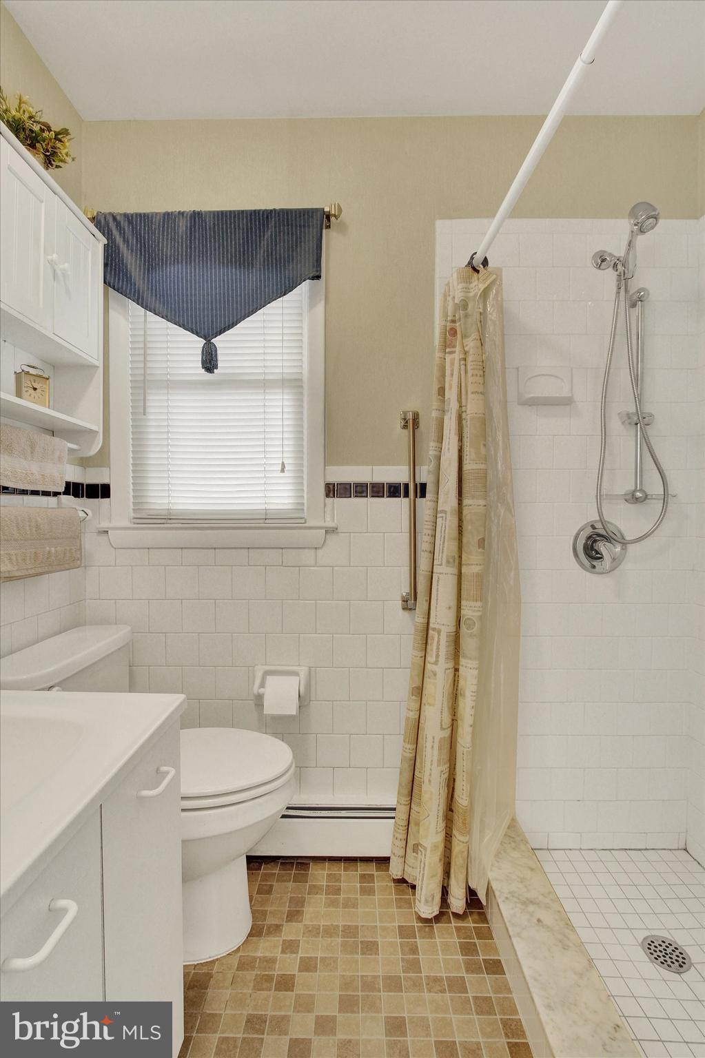 110 Lees Mill Road Hampstead, MD 21074 - Photo 22 of 39 a bathroom with a toilet and a shower