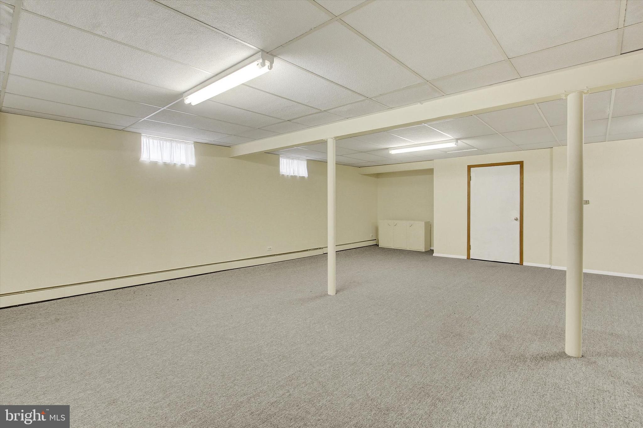 110 Lees Mill Road Hampstead, MD 21074 - Photo 31 of 39 an empty room with windows