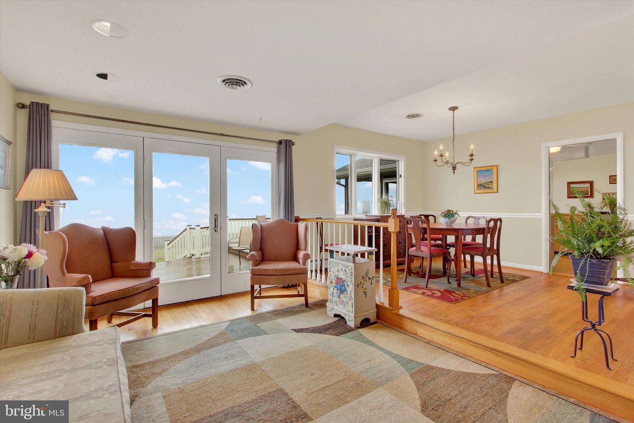 110 Lees Mill Road Hampstead, MD 21074 - Photo 9 of 39 a living room with furniture and a large window