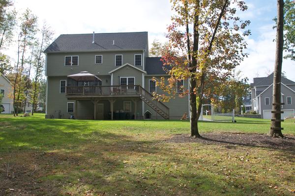 4 Devonshire Road Amesbury, MA 01913 - Photo 23 of 23 a front view of house with yard and green space
