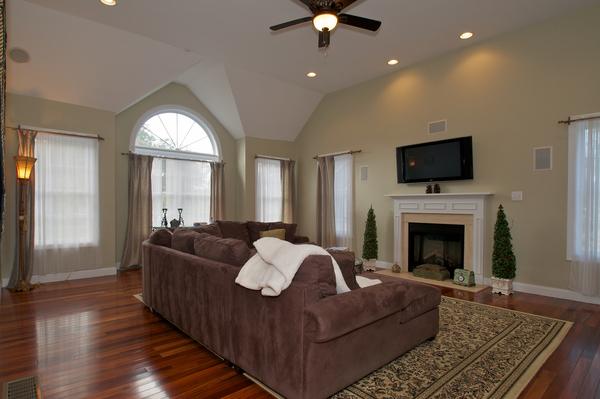 4 Devonshire Road Amesbury, MA 01913 - Photo 4 of 23 a living room with furniture fireplace and flat screen tv