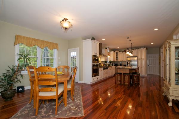 4 Devonshire Road Amesbury, MA 01913 - Photo 7 of 23 a living room with dining room and wooden floor