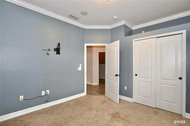 a bathroom with a sink toilet a mirror and shower