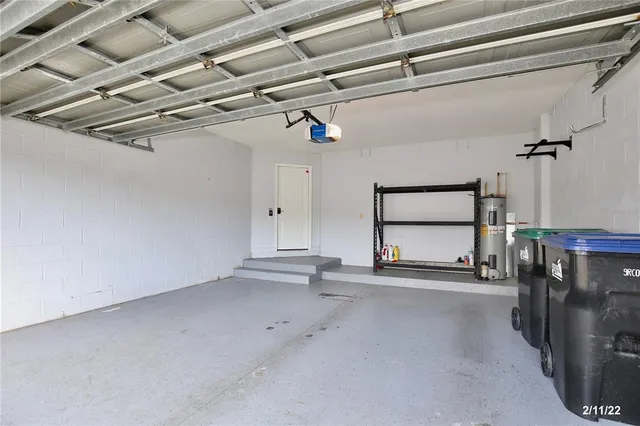 a swimming pool with outdoor seating