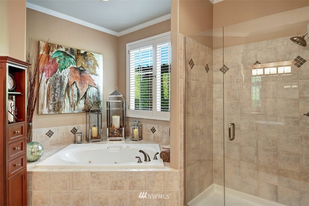 15420 Southeast 133rd Street Renton, WA 98059 - Photo 17 of 26 a bathroom with a tub a sink and a window