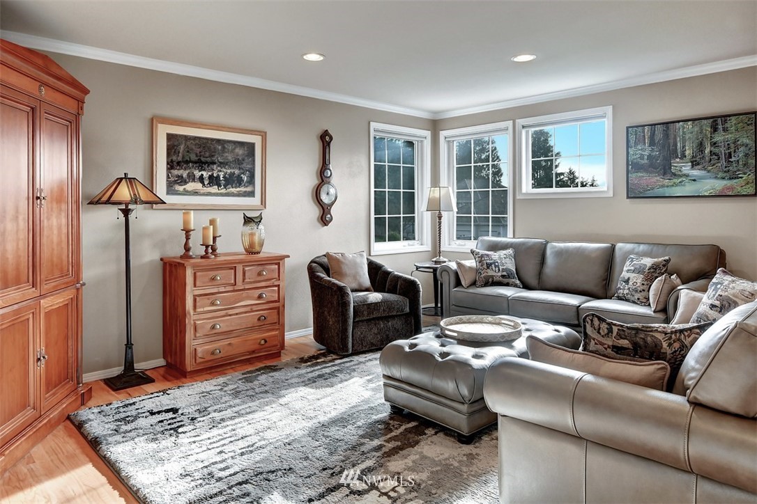 15420 Southeast 133rd Street Renton, WA 98059 - Photo 18 of 26 a living room with furniture and a rug