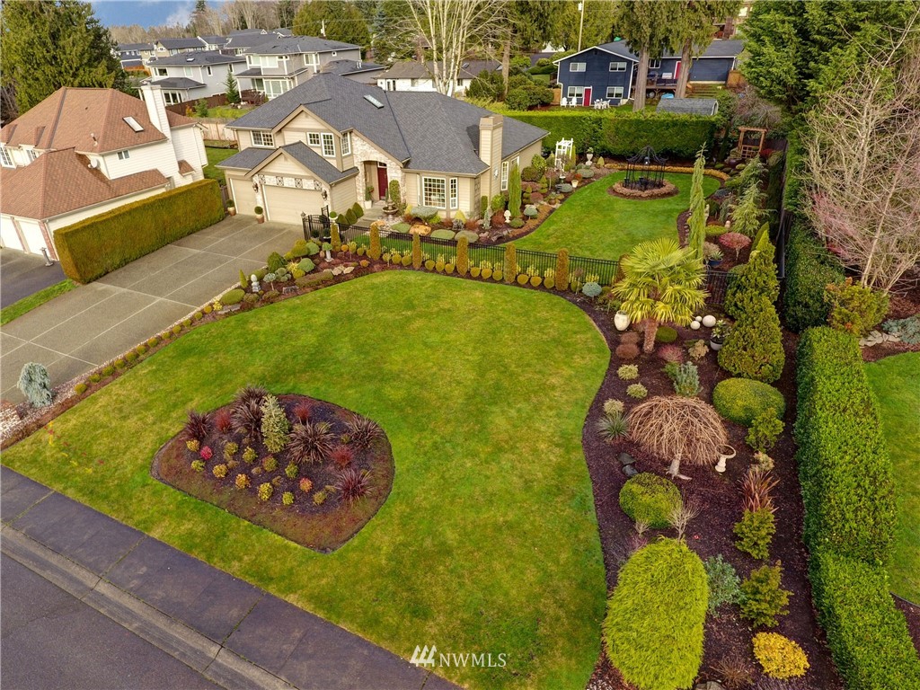 15420 Southeast 133rd Street Renton, WA 98059 - Photo 26 of 26 an aerial view of a swimming pool patio and outdoor seating