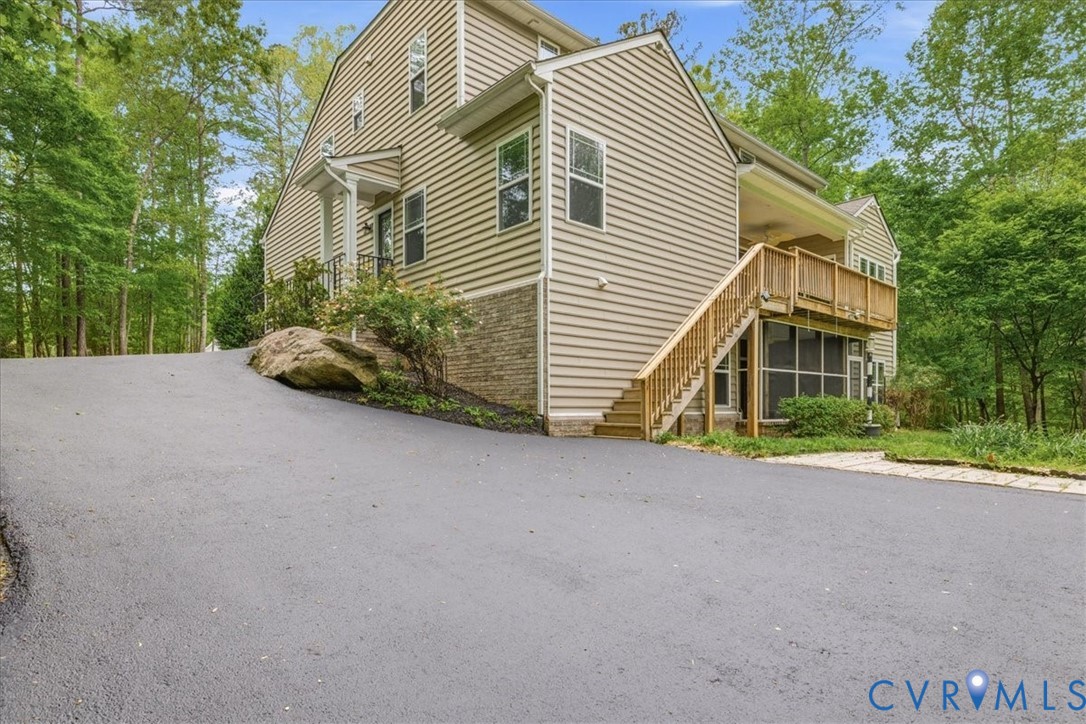 12401 Duntrune Court Chesterfield, VA 23838 - Photo 6 of 8 The driveway extends to the rear of the home for a