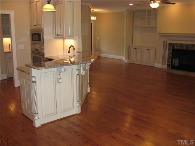 862 Shelley Road Raleigh, NC 27609 - Photo 23 of 25 TREMENDOUS OPEN FLOORPLAN!!! BEAUTIFUL HARDWOODS, HIGH LEVEL GRANITE, SUBWAY TILE BACKSPLASH, SS APPLIANCES, RECESSED LIGHTING, BUILT-IN BOOKCASE, AND GAS LOG FIREPLACE!!!