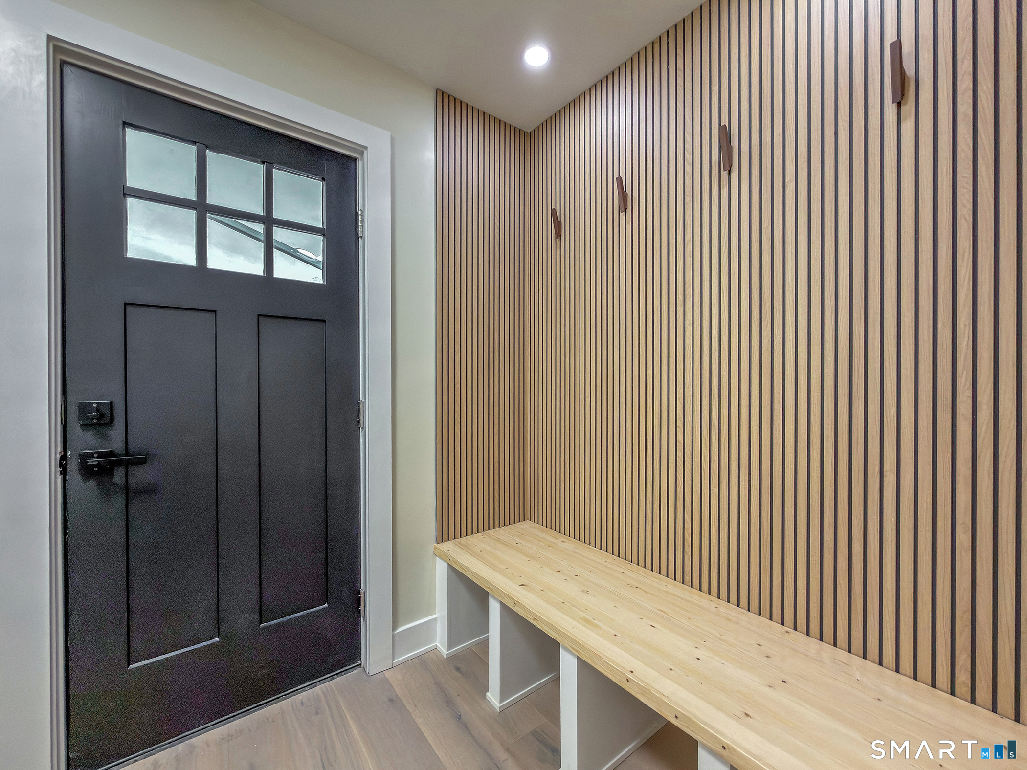 53 Mountain Lake Road Warren, CT 06777 - Photo 31 of 40 a view of a hallway with wooden floor