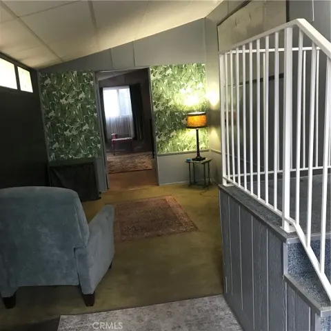 a view of a porch with furniture