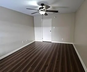 a view of room with hardwood floor