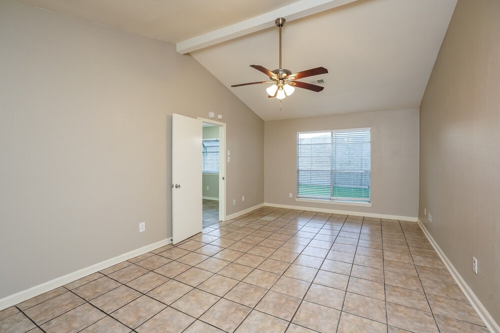 20117 Dawn Mist Drive Humble, TX 77346 - Photo 11 of 16 a view of an empty room with a window