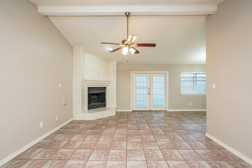 20117 Dawn Mist Drive Humble, TX 77346 - Photo 5 of 16 a view of an empty room with a window