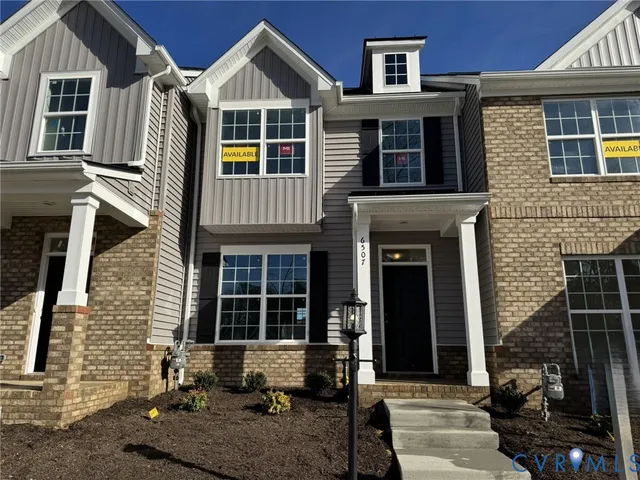 a front view of a house with balcony