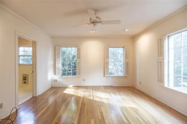 a view of an empty room and window