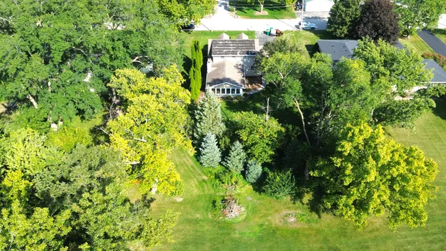 a view of a livingroom with furniture and a flat screen tv