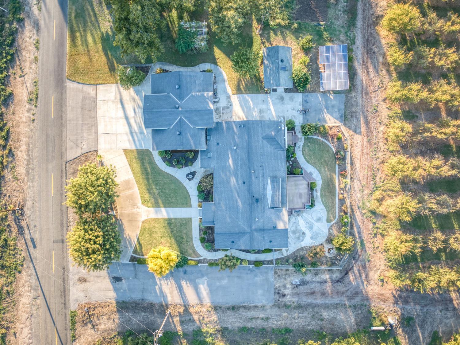 8646 Cairo Avenue Laton, CA 93242 - Photo 37 of 38 a aerial view of a house with swimming pool