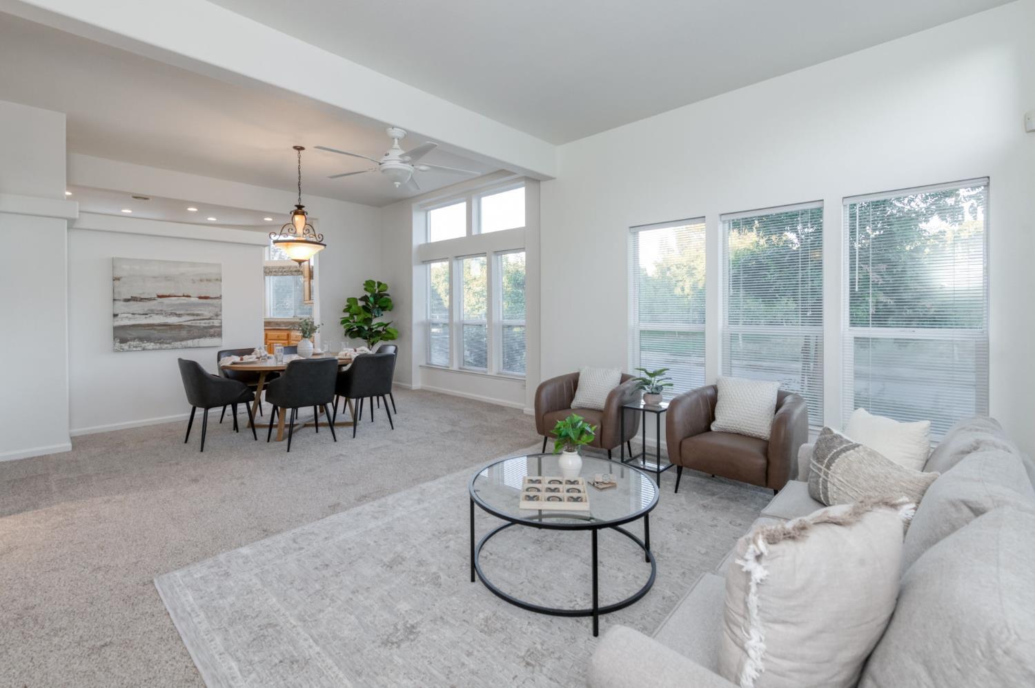 8646 Cairo Avenue Laton, CA 93242 - Photo 6 of 38 a living room with furniture and a large window