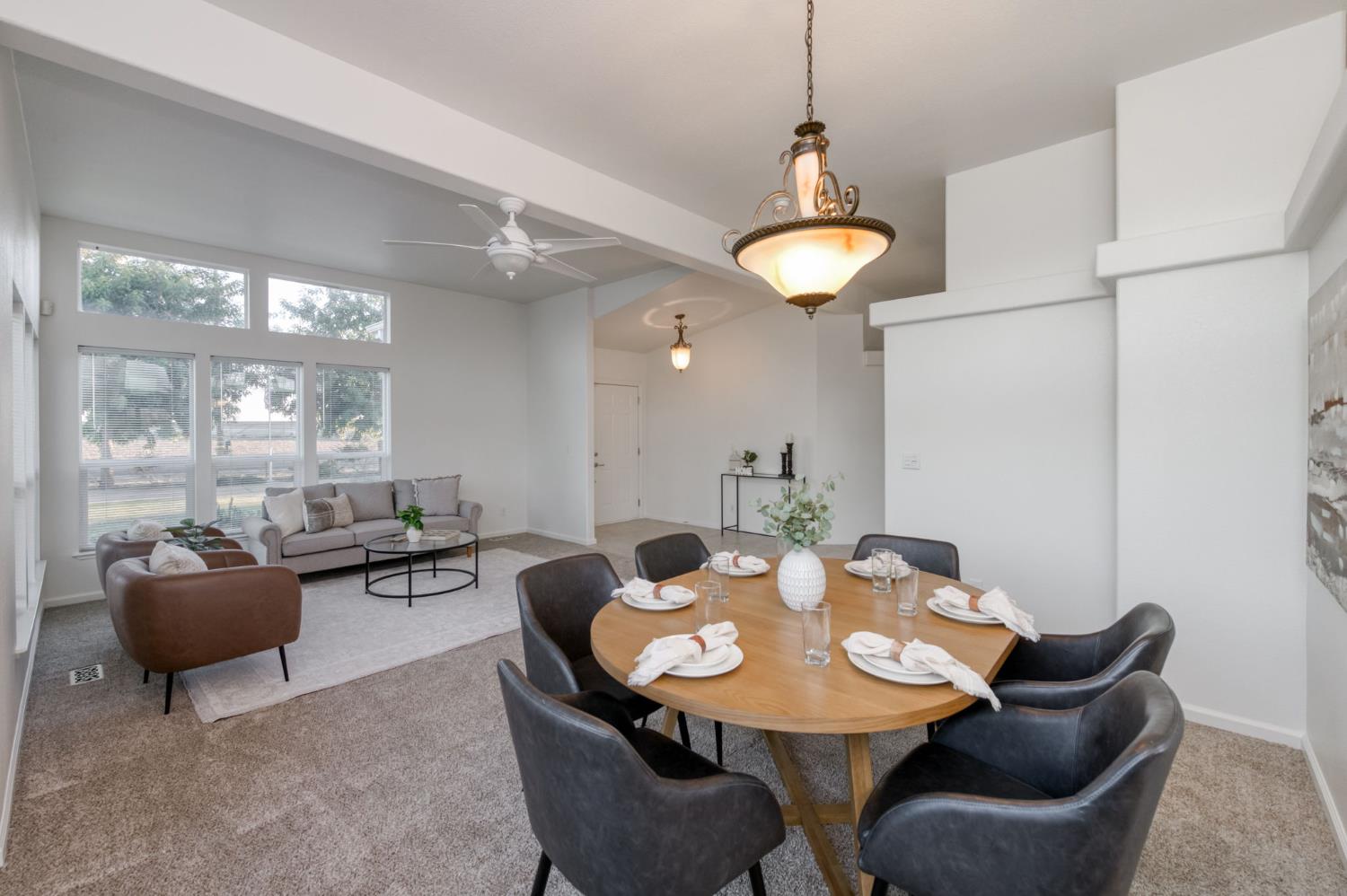 8646 Cairo Avenue Laton, CA 93242 - Photo 7 of 38 a view of a dining room with furniture and chandelier
