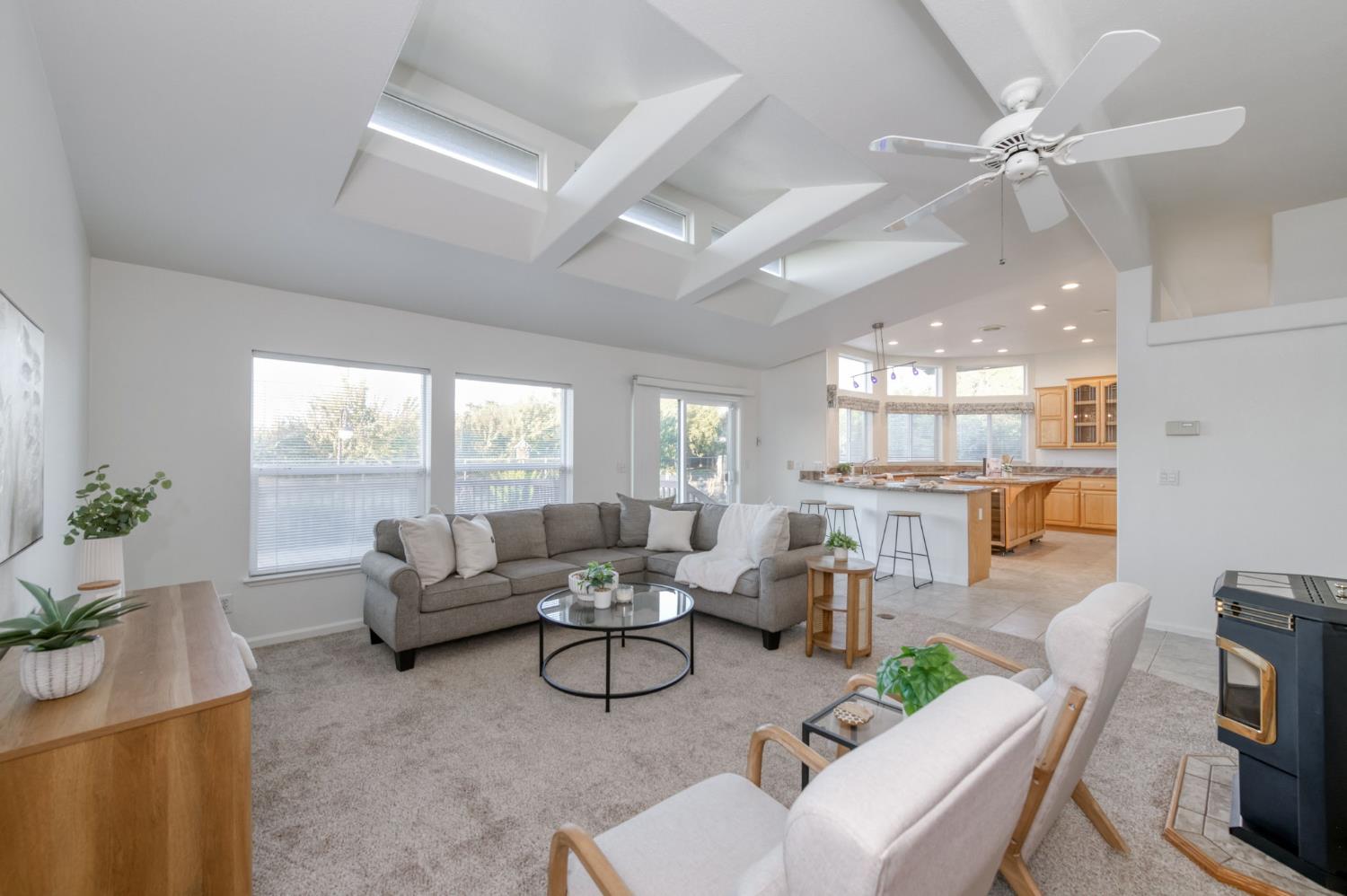 8646 Cairo Avenue Laton, CA 93242 - Photo 9 of 38 a living room with furniture and a large window with garden view