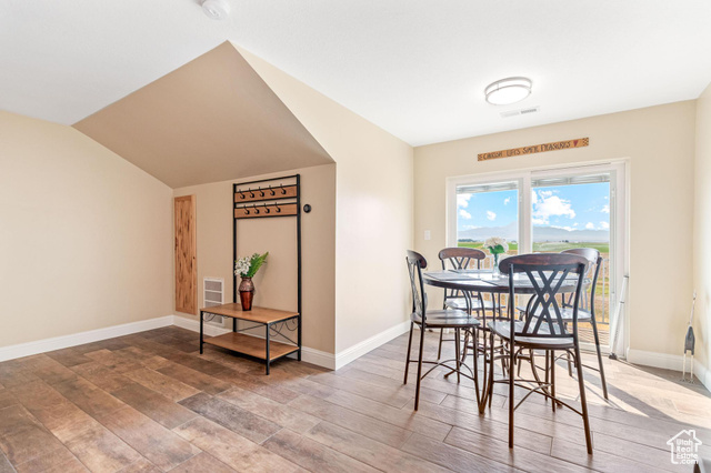 19502 South Olson Road Downey, ID 83234 - Photo 49 of 64 ADU: Dining room featuring light wood finished floors and lofted ceiling