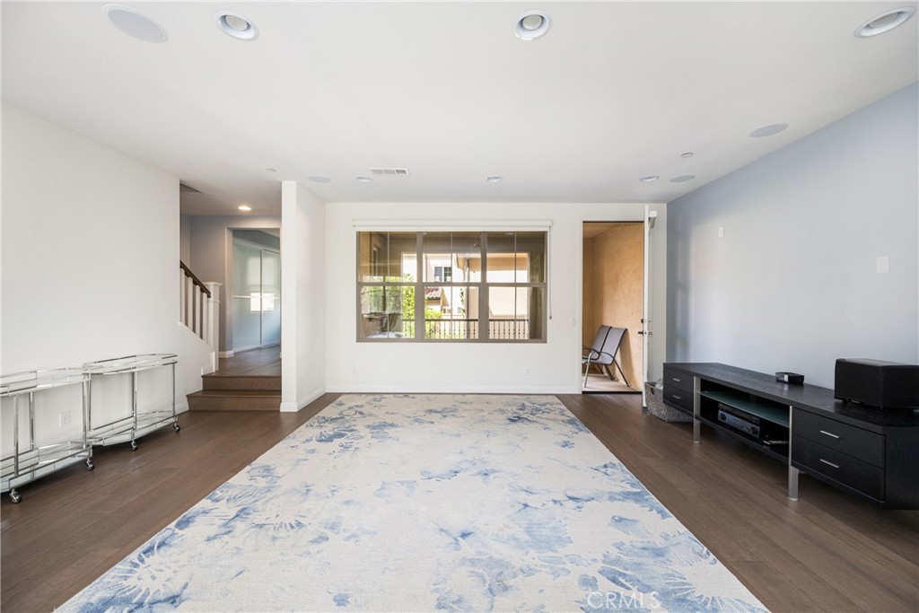 94 Capricorn Irvine, CA 92618 - Photo 14 of 47 a view of a bedroom with furniture and windows