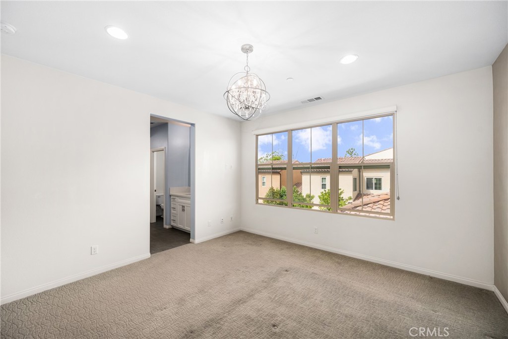 94 Capricorn Irvine, CA 92618 - Photo 17 of 47 a view of an empty room with a window