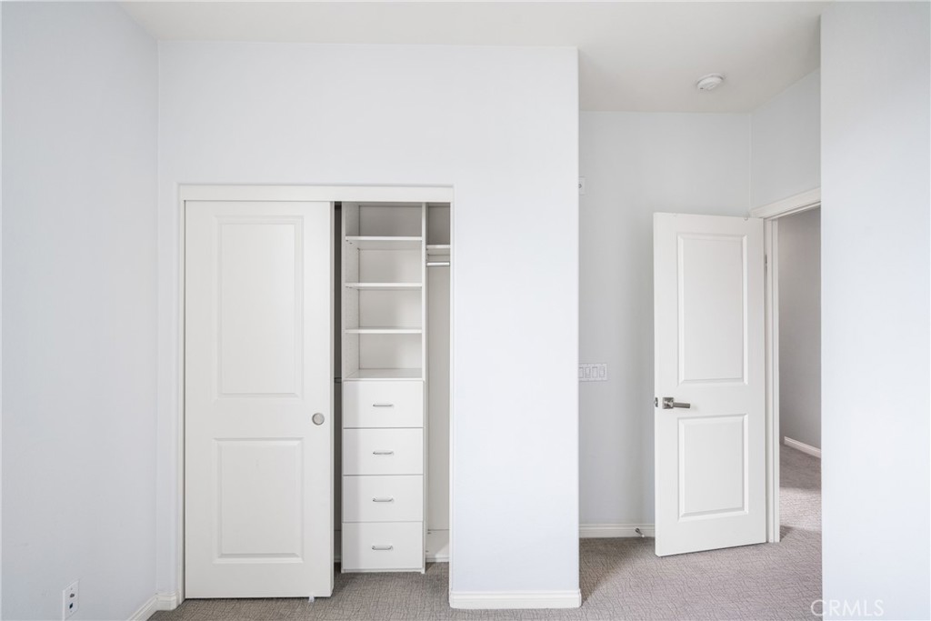 94 Capricorn Irvine, CA 92618 - Photo 22 of 47 an empty room with closet