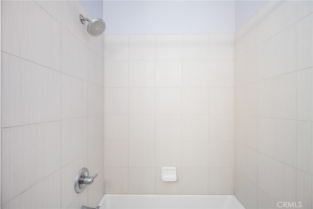 94 Capricorn Irvine, CA 92618 - Photo 25 of 47 a bathroom with a shower