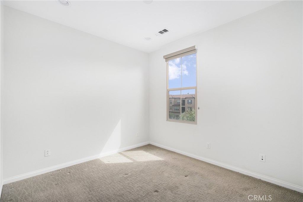 94 Capricorn Irvine, CA 92618 - Photo 26 of 47 an empty room with a window