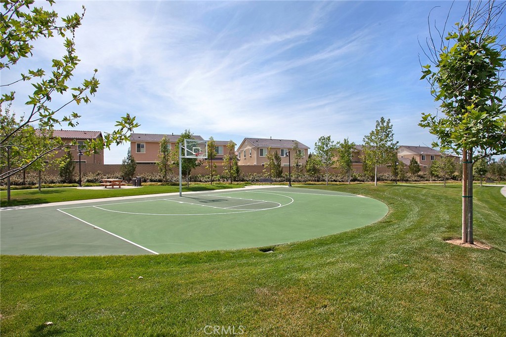 94 Capricorn Irvine, CA 92618 - Photo 35 of 47 a view of a playground with basketball court