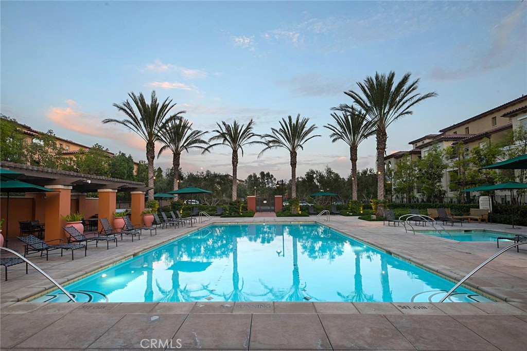 94 Capricorn Irvine, CA 92618 - Photo 44 of 47 a view of swimming pool with chairs