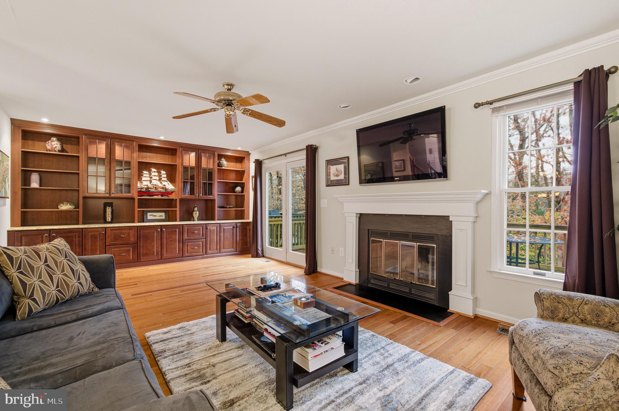 134 Spring Pl Way Annapolis, MD 21401 - Photo 18 of 59 a living room with furniture and a fireplace