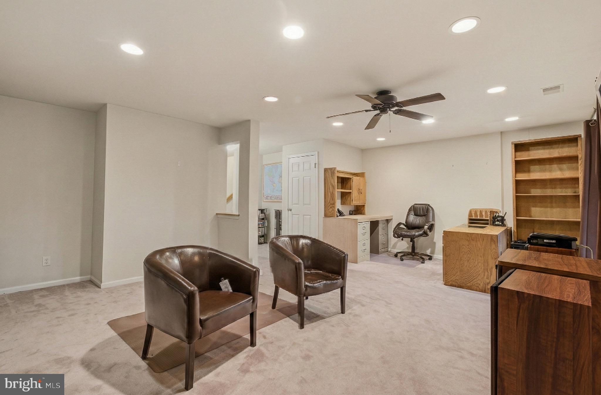 134 Spring Pl Way Annapolis, MD 21401 - Photo 28 of 59 a living room with furniture and a ceiling fan