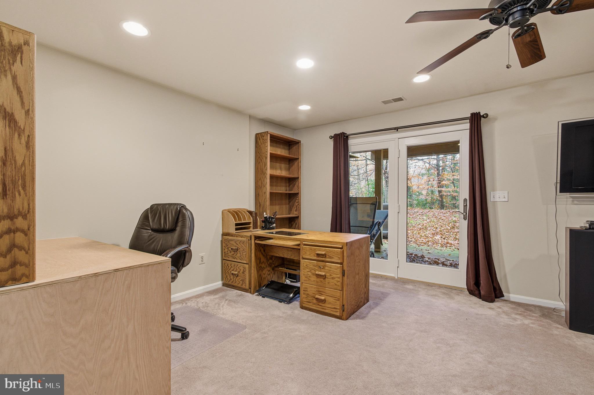 134 Spring Pl Way Annapolis, MD 21401 - Photo 30 of 59 a view of a workspace with furniture and a window