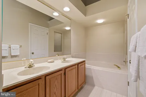 a view of swimming pool with a patio