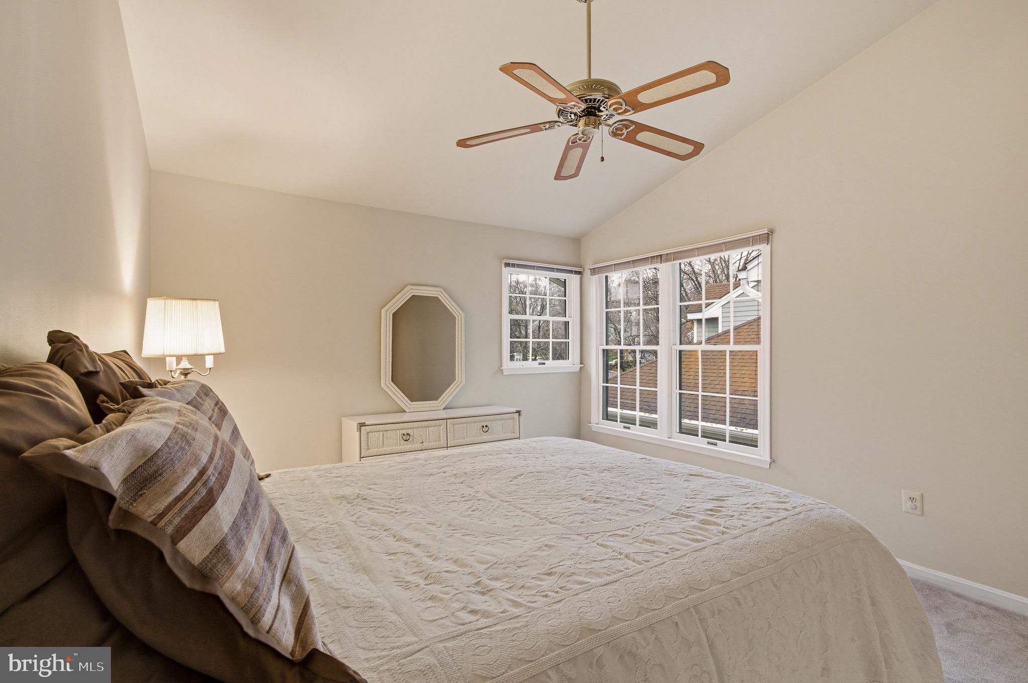 134 Spring Pl Way Annapolis, MD 21401 - Photo 39 of 59 a bedroom with a large bed and a window