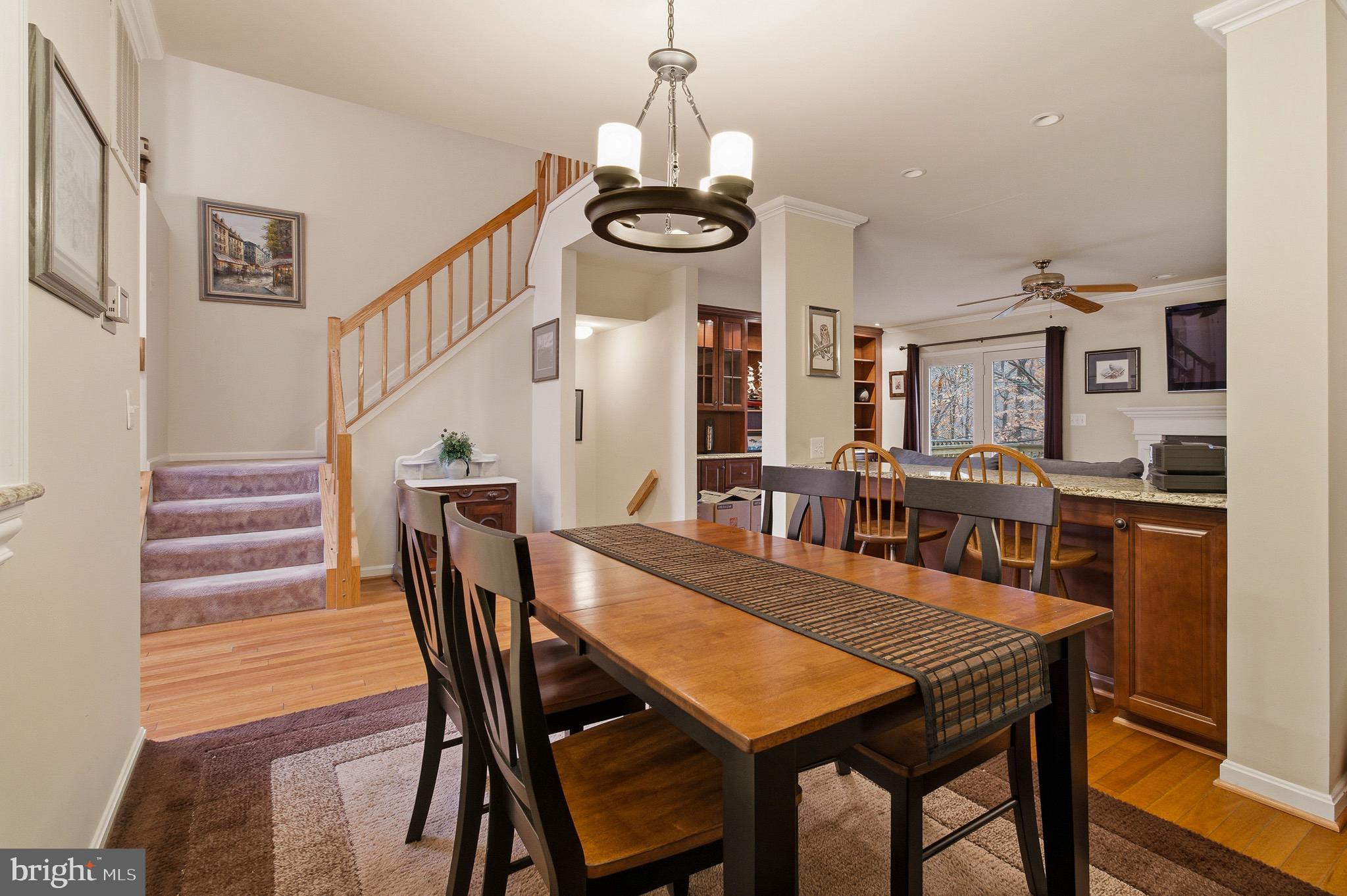 134 Spring Pl Way Annapolis, MD 21401 - Photo 10 of 59 a view of a dining room with furniture and wooden floor