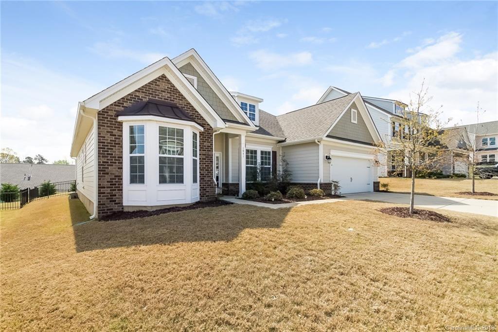 1841 Larkspur Way Tega Cay, SC 29708 - Photo 1 of 27 a front view of a house with a yard
