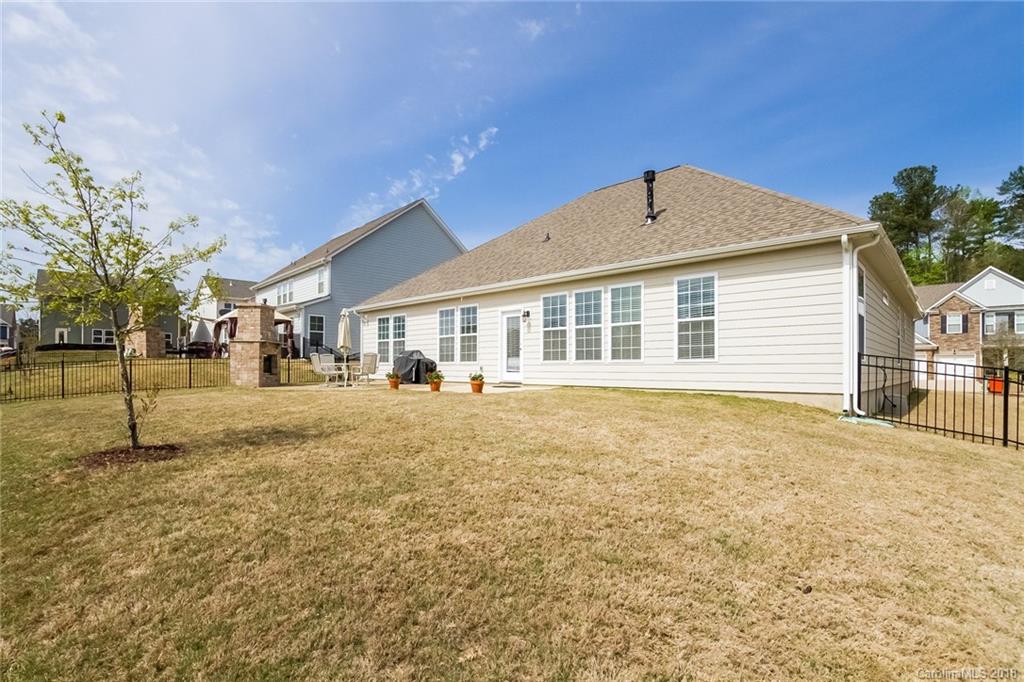 1841 Larkspur Way Tega Cay, SC 29708 - Photo 26 of 27 a front view of a house with a yard