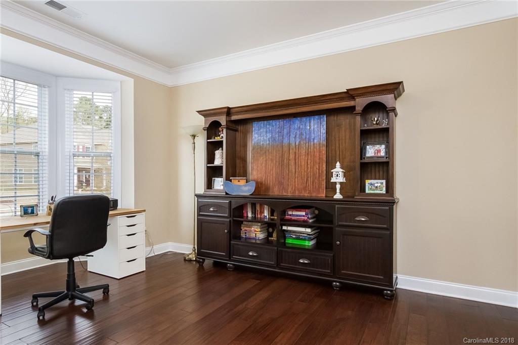 1841 Larkspur Way Tega Cay, SC 29708 - Photo 7 of 27 a living room with furniture and a window